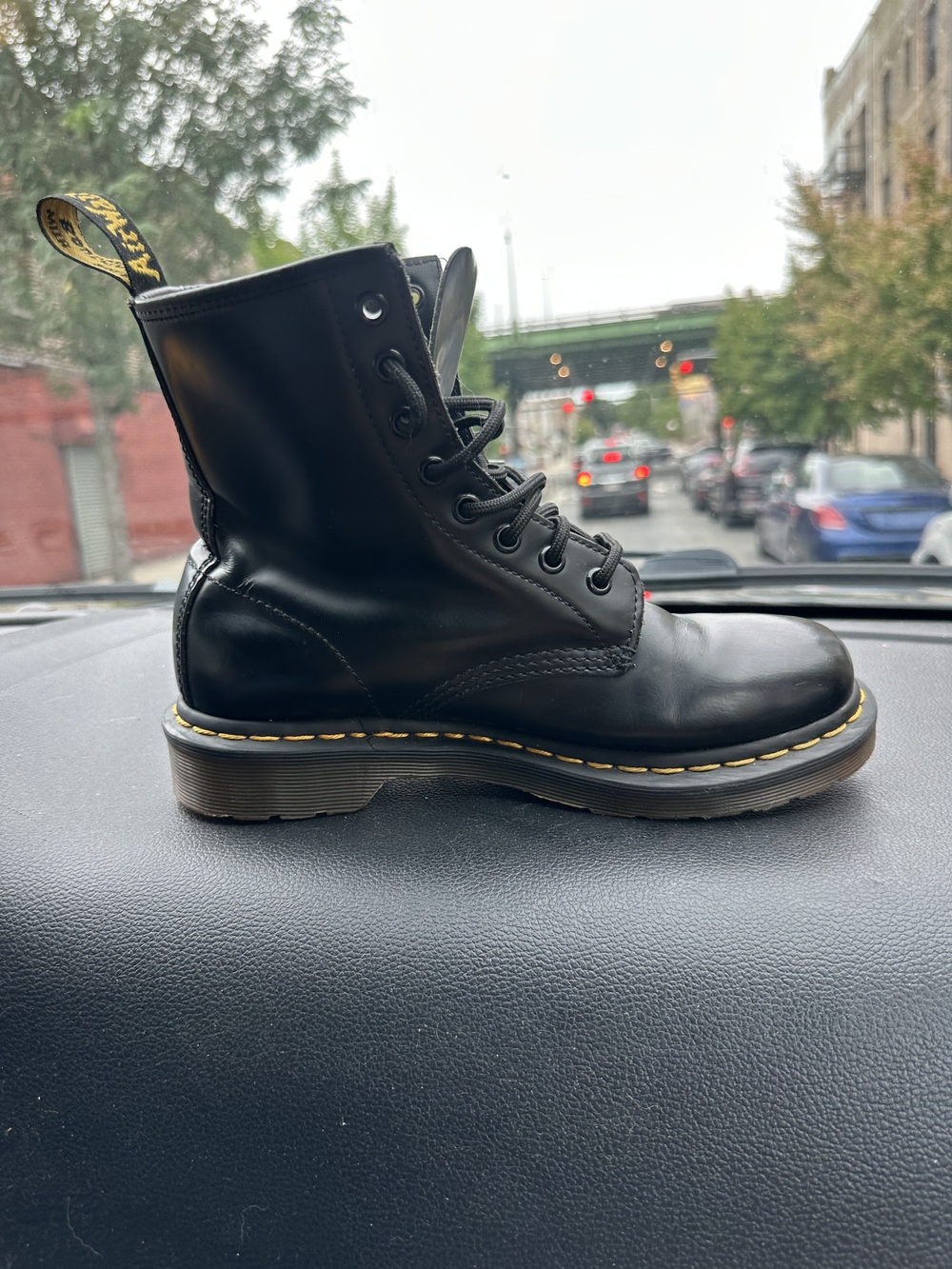 Dr. Martens Black Leather 8-Eye Lace-Up Boot with Yellow Stitching